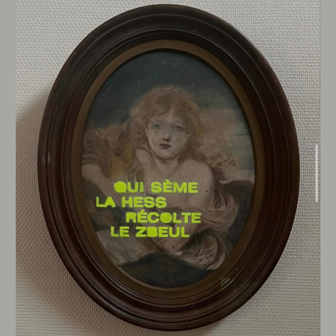 Artwork 6: An oval-framed portrait overlaid with the fluorescent slogan Qui sème la hess récolte le zbeul.